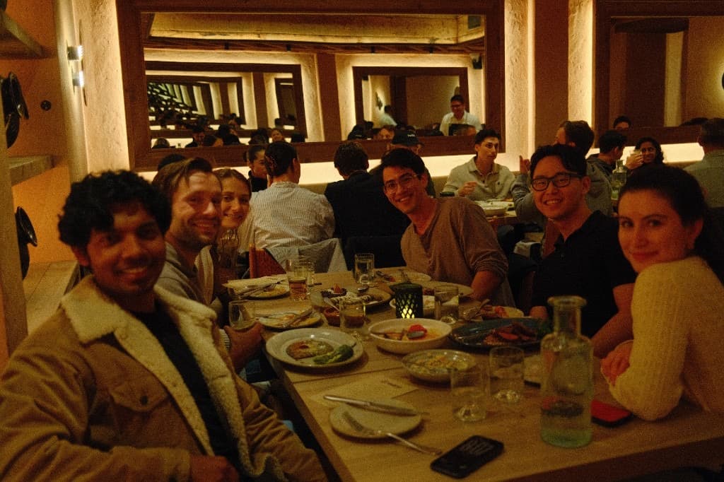 Warp team hanging out at a company dinner
